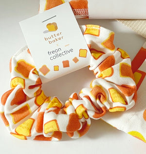 
            
                Load image into Gallery viewer, Organic Cotton Hair Scrunchie - Butter Baker
            
        