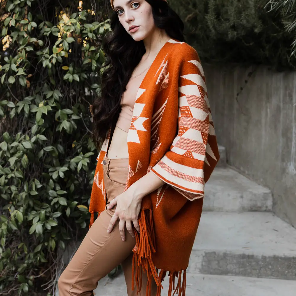 
                      
                        Aztec Fringed Cape
                      
                    