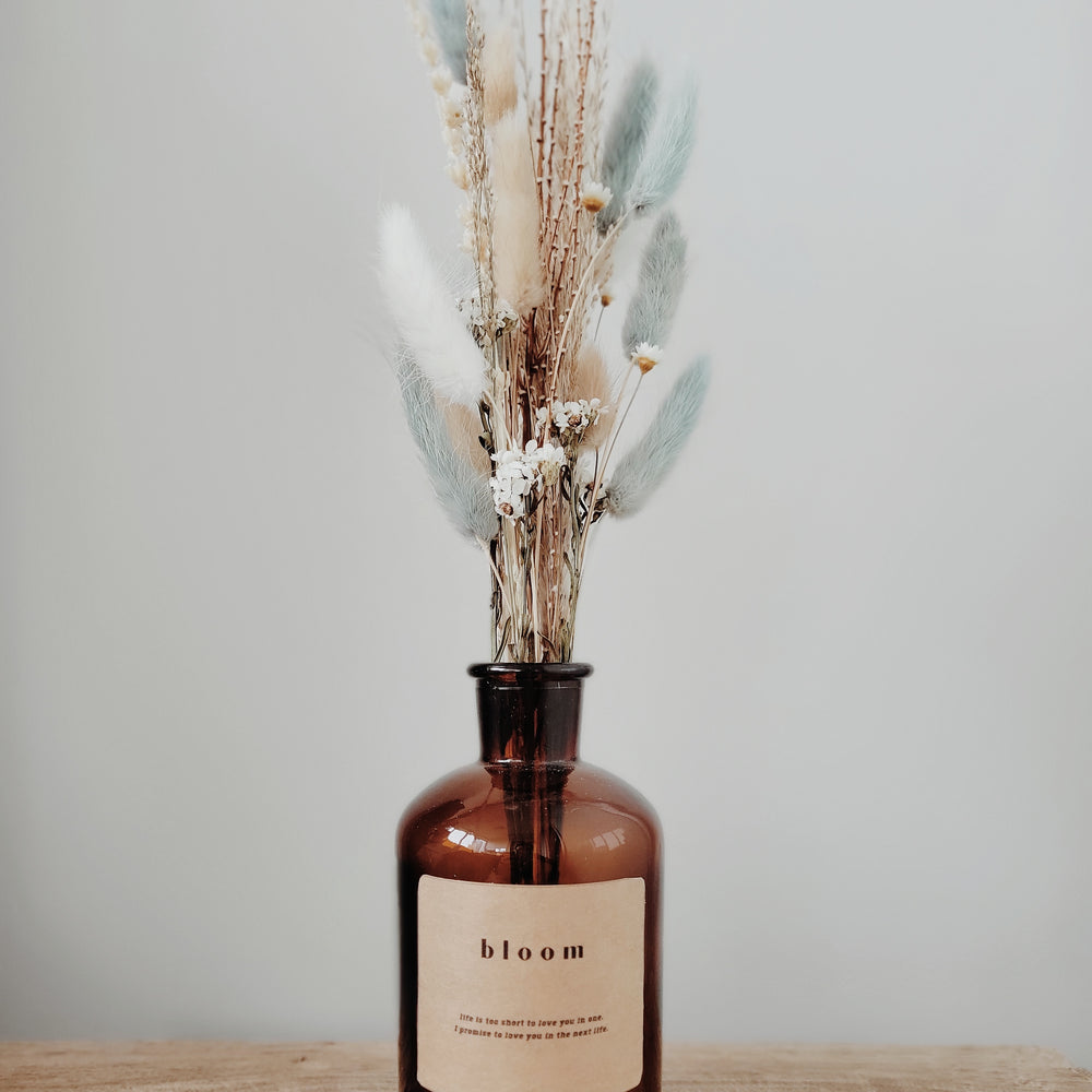 
                      
                        Dried Bouquet in Glass Vase
                      
                    